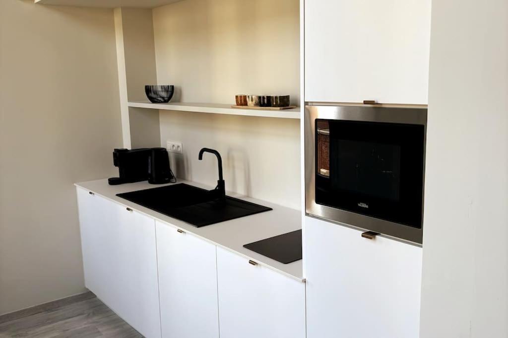 Au Cabinet Childeric Apartment ตูร์แน ภายนอก รูปภาพ